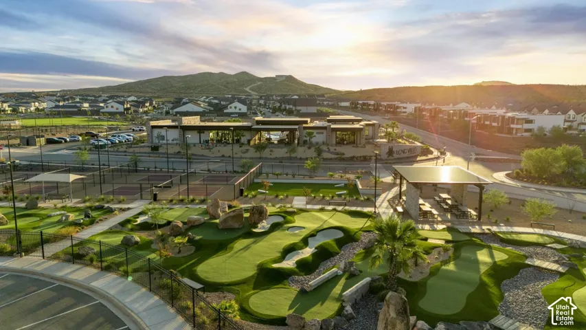 Community recreation area featuring a miniature golf course, multi-use sports courts, and covered picnic pavilions