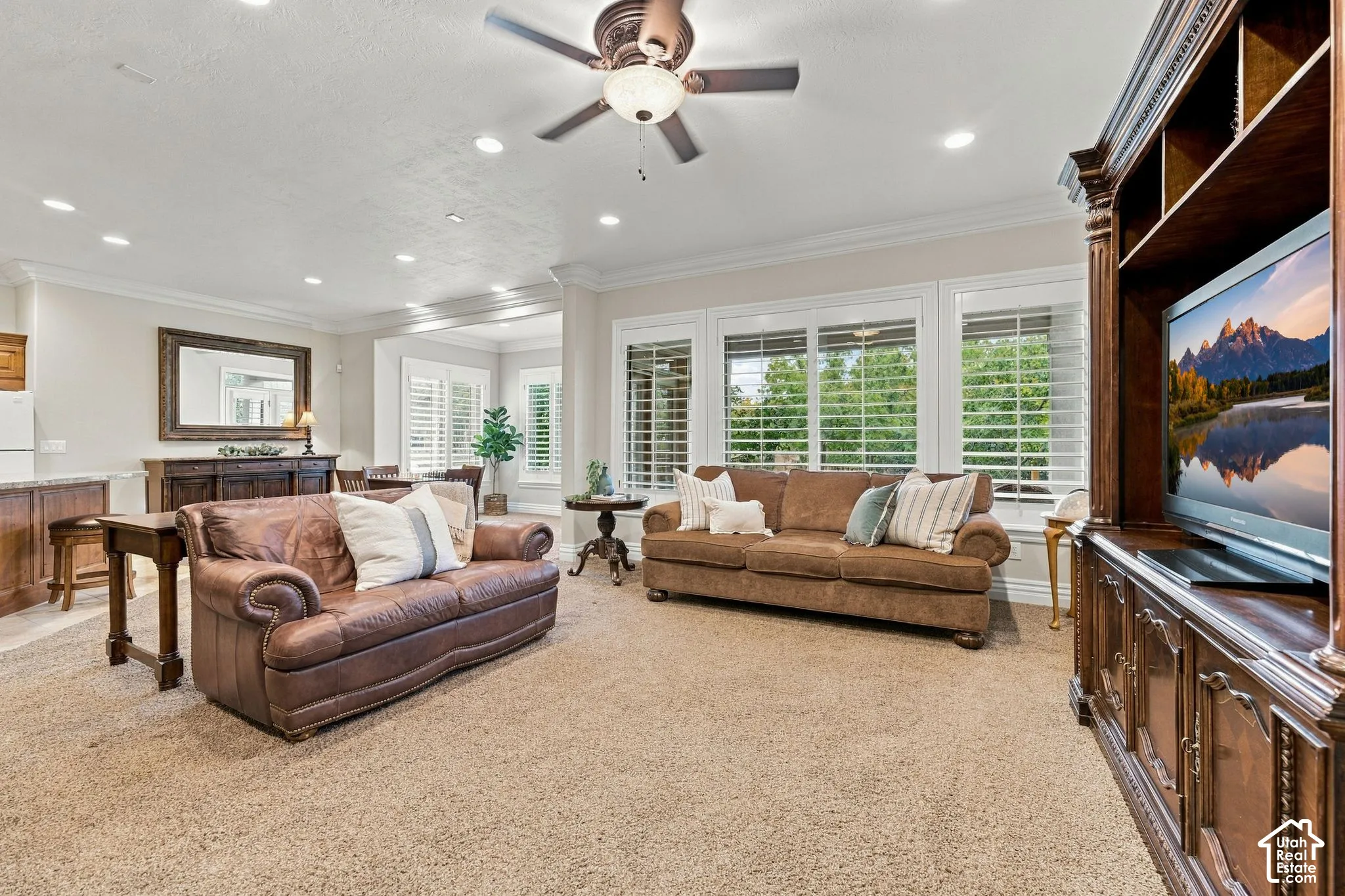 Family Room with Large Windows and Plantation Shutters