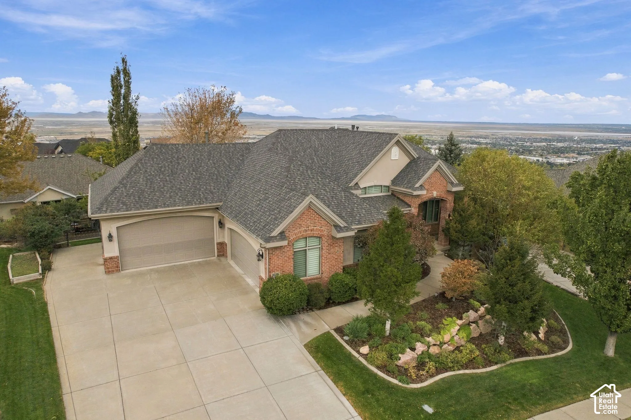 Beautifully Landscaped, 4 Garages, 31' RV Parking Pad on an Extremely Quiet Street!
