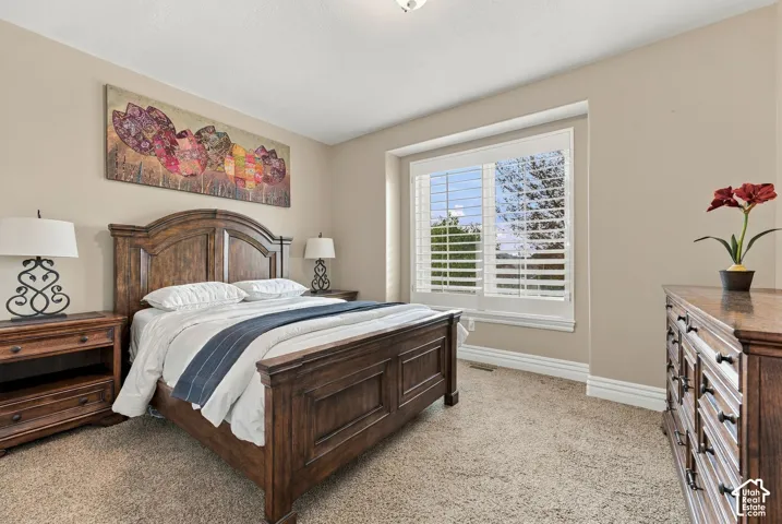 Second Bedroom on Main is Spacious with Large Window and Views