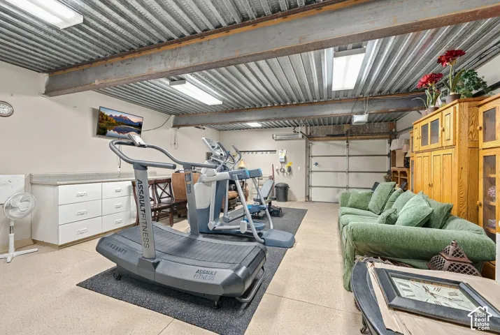 Amazing 28'X22' MAN CAVE, GOLF CART, ATV, EXERCISE ROOM, WORKSHOP, STORAGE ROOM! Pathway from Driveway to this Garage Door for easy Golf Cart, ATV storing! Golf Course One Block South!