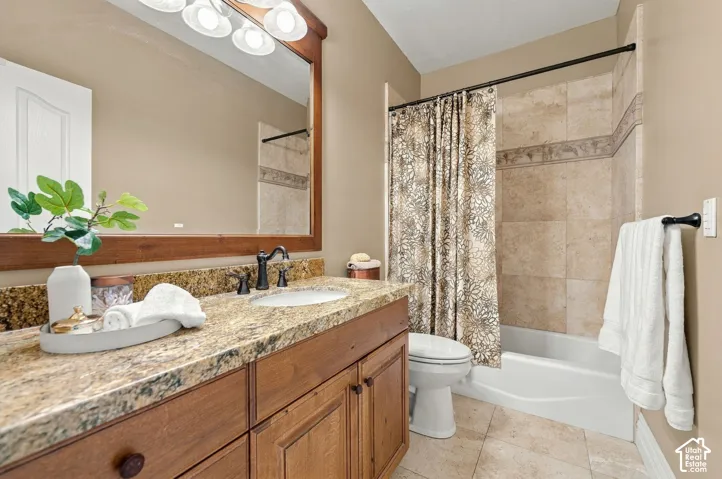Main Bathroom has Granite and Tile Floors, Custom Cabinetry