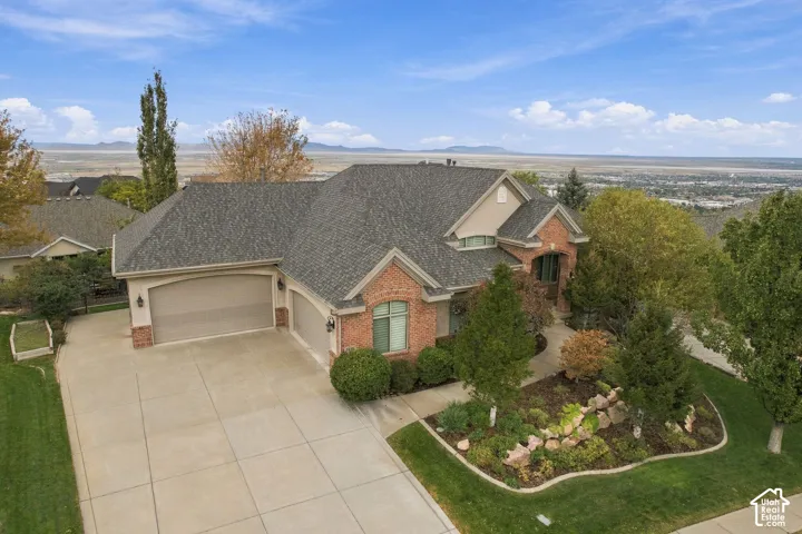 Beautifully Landscaped, 4 Garages, 31' RV Parking Pad on an Extremely Quiet Street!