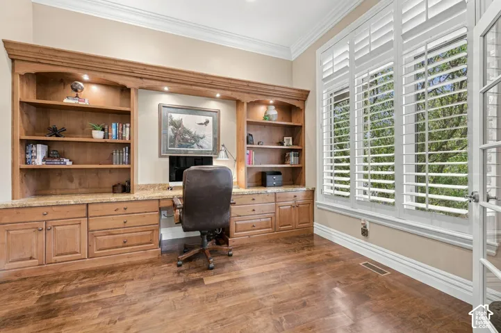 Private Office with Custom Cabinetry and Lighting, Hardwood Floors and Large Windows