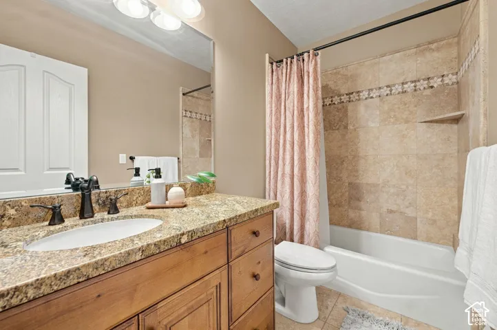 Downstairs Bathroom with Granite, Tile Floors and Custom Cabinetry