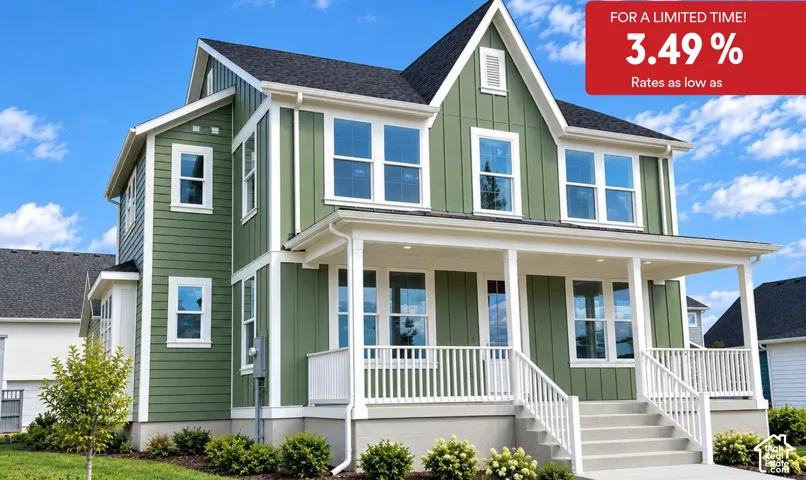Two-story exterior featuring vertical board-and-batten siding, a covered front porch with white railing, and a gabled roofline