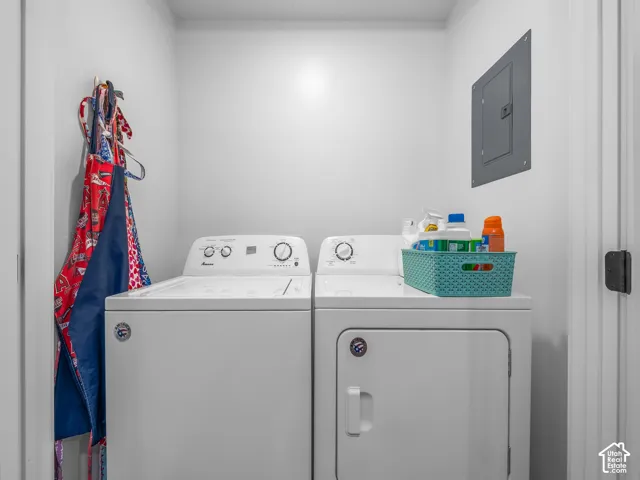 Laundry space featuring dedicated appliance hookups and a recessed electrical service panel