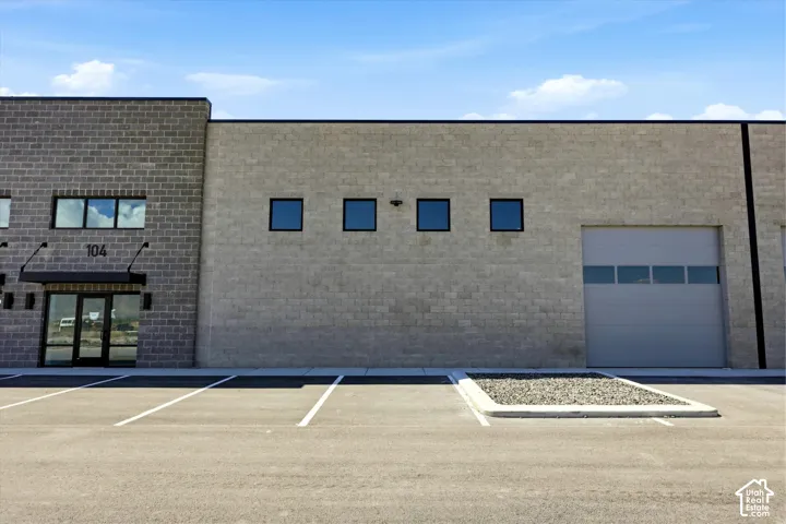 Block construction exterior with multiple window styles