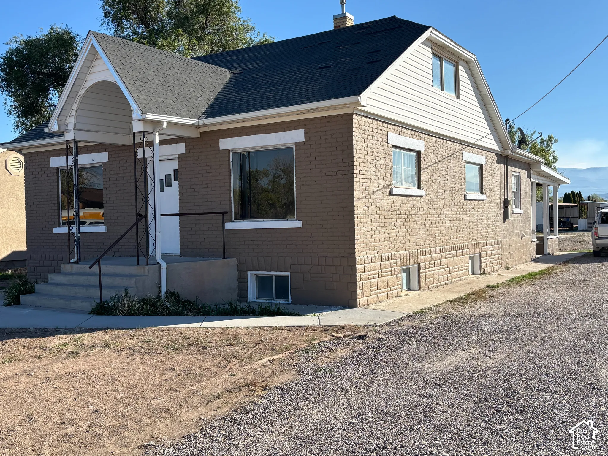 Brick exterior with a gabled roofline