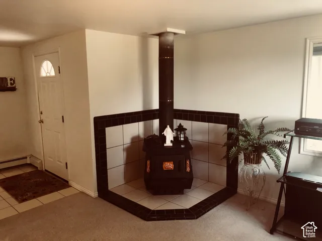 Wood-burning stove with a tiled surround