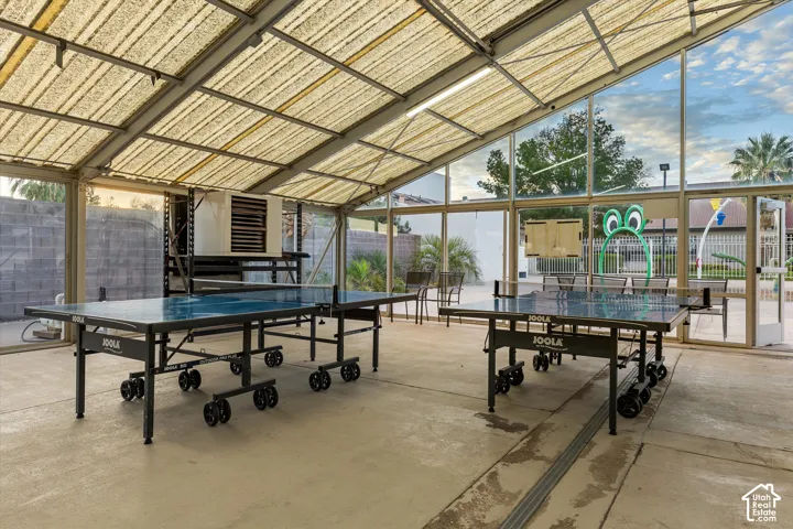 Indoor Pool: Ping pong tables inside the indoor pool enclosure, with the splash pad just outside.