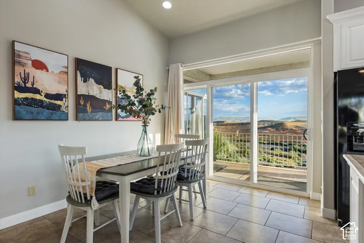 Dining: The dining area slides right out to the covered deck, with desert views just outside.