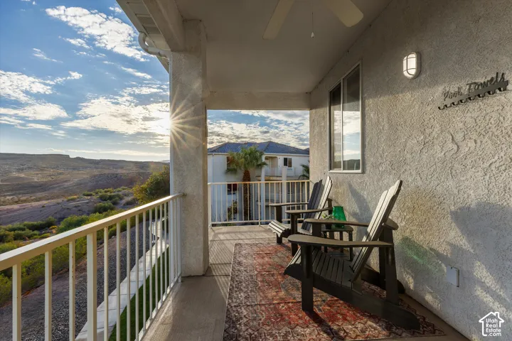 Deck: A spot to settle in on the covered deck, with outdoor lighting and a ceiling fan overhead.