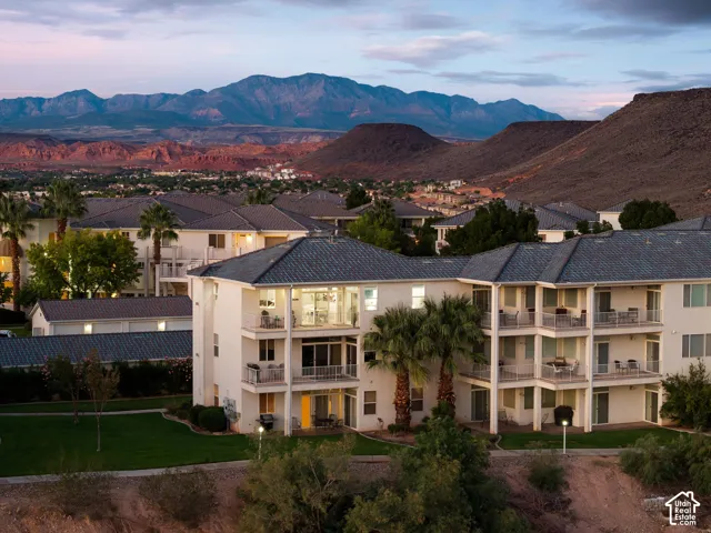 Aerial: Red Bluff and the ridges of Green Valley Gap rise beyond Las Palmas at dusk.