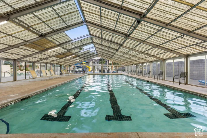 Indoor Pool: A heated indoor lap pool under a glass enclosure, ready for laps all year.