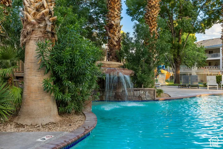 Pool: The waterfall up close, tucked among the palms.