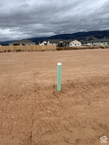 Cleared lot featuring expansive space and mountain backdrop