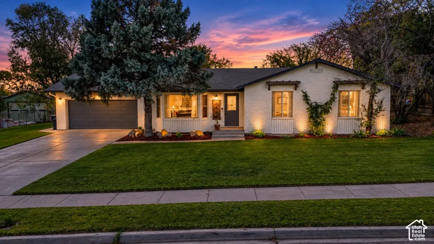 White brick exterior with dark trim accents