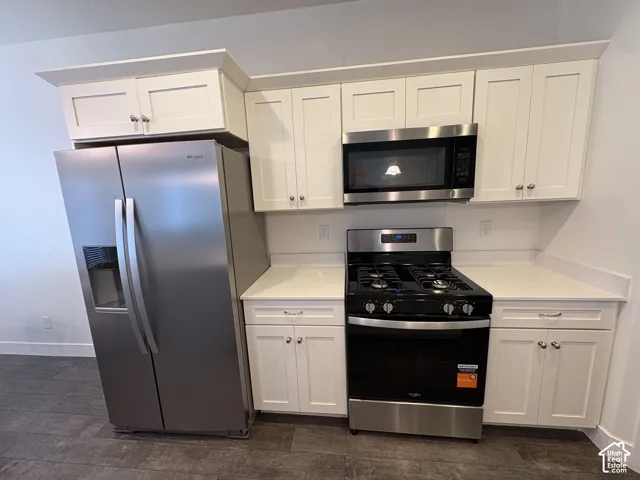 Kitchen with new appliances shown