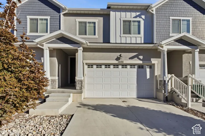 Contemporary multi-level exterior with a two-car garage