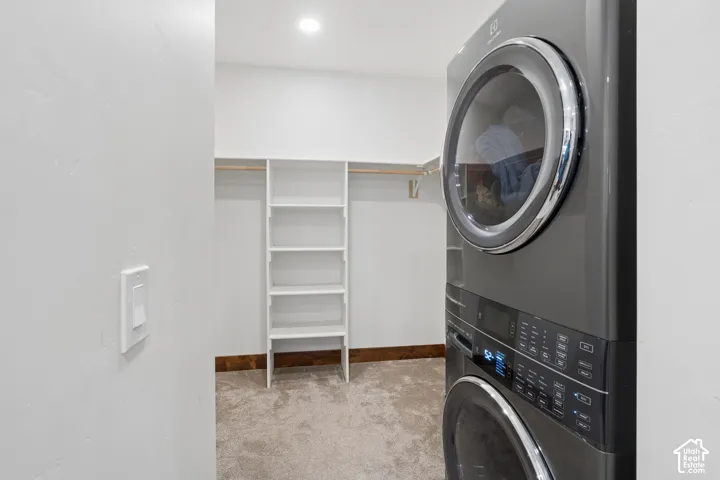 Built-in shelving, wood-finish flooring, and recessed lighting