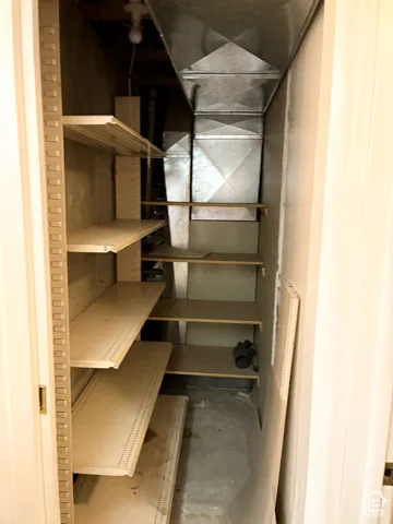 Built-in metal shelving units with adjustable tracks