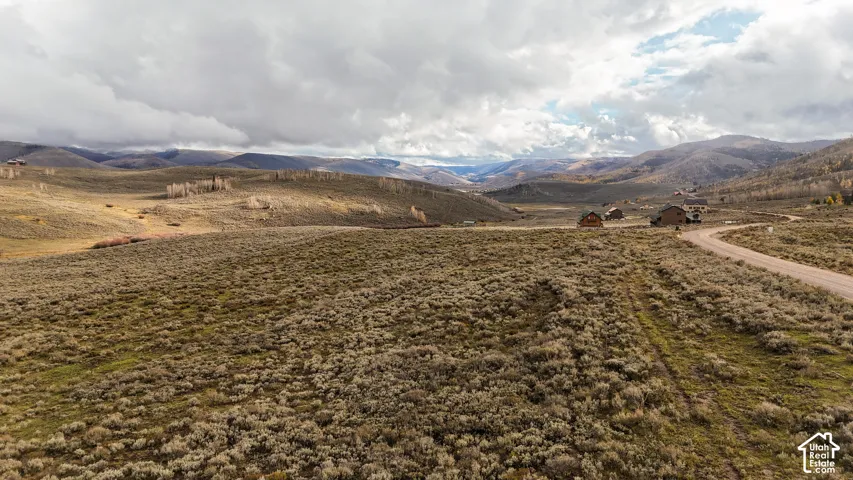 Expansive acreage featuring rugged topography, natural sagebrush vegetation, and mountain vistas
