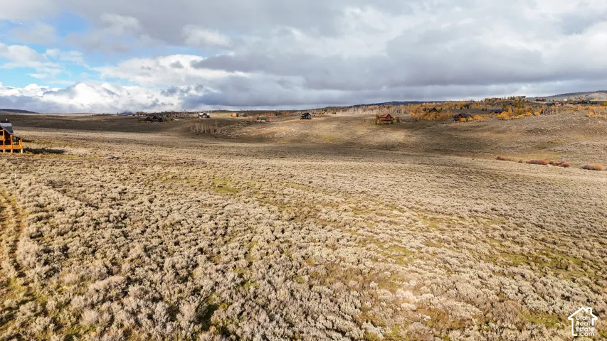 Expansive rural acreage characterized by native high-desert vegetation and rolling topography