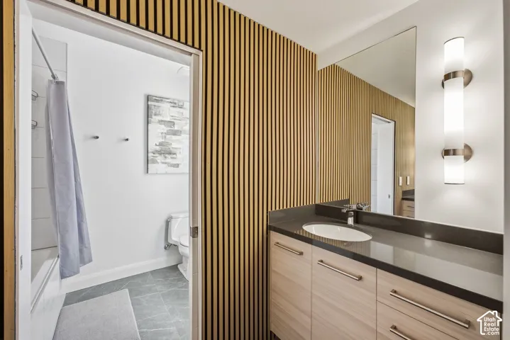 Full bathroom with 2 vanities.