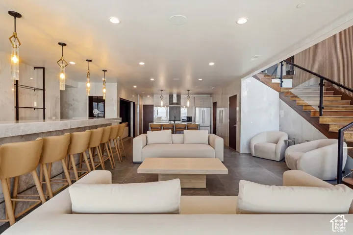 Open entertaining space with full kitchen, bar with , theater that leads to 2 bedrooms and a full bathroom
