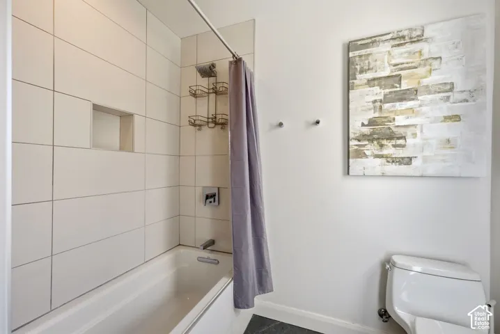 Full bathroom with 2 vanities.