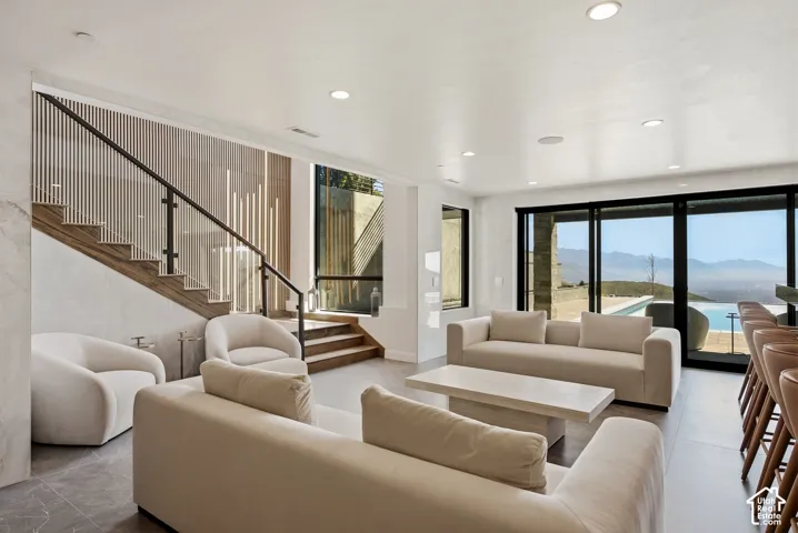 Walkout to the patio and infinity edge pool.