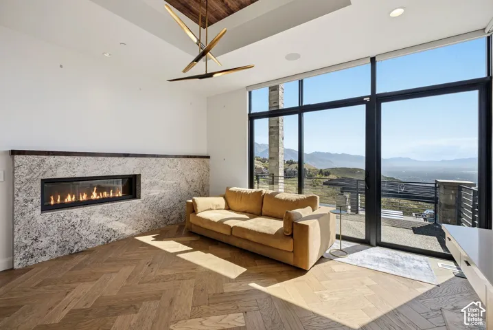 Office space on main level with patio access and fireplace.
