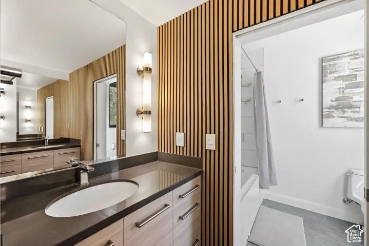 Full bathroom with 2 vanities.