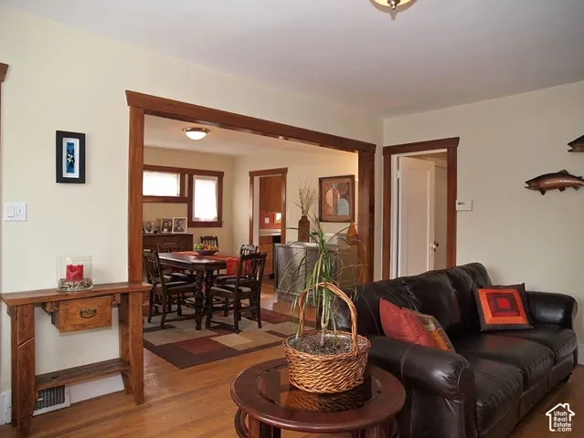 Natural wood-finish trim, hardwood flooring, and neutral wall tones