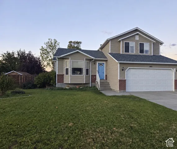 Photo has been altered only to remove dumpster from driveway.