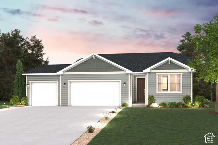 Single-story residence featuring light gray horizontal lap siding, a three-car garage, charcoal-toned shingle roofing, gable architectural detailing, and a concrete driveway