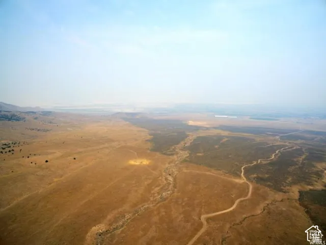 Aerial view of property and surrounding area with rural landscape