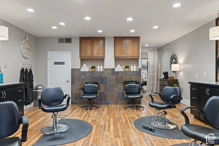 Two Professional Shampoo & Wash Stations with Built-In Cabinetry and Tile Surround