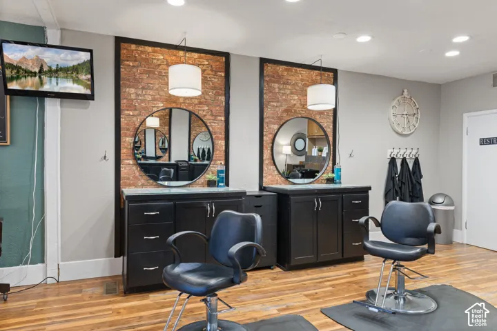 Fully equipped styling stations - Moden salon chairs, elegant mirrors, custom cabinetry and warm inviting finishes create a professional, welcoming atmosphere in this turnkey salon space.