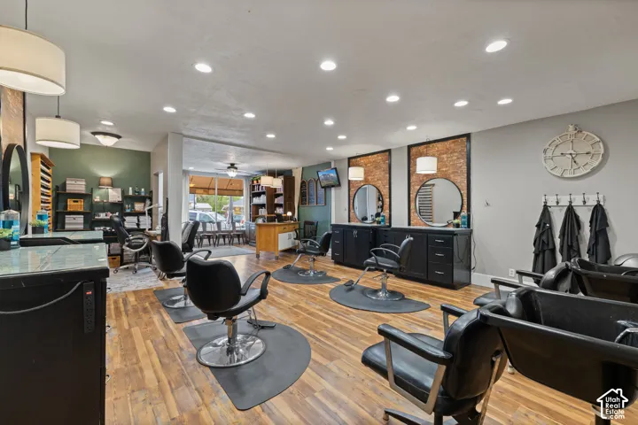 Fully equipped styling stations - Moden salon chairs, elegant mirrors, custom cabinetry and warm inviting finishes create a professional, welcoming atmosphere in this turnkey salon space.