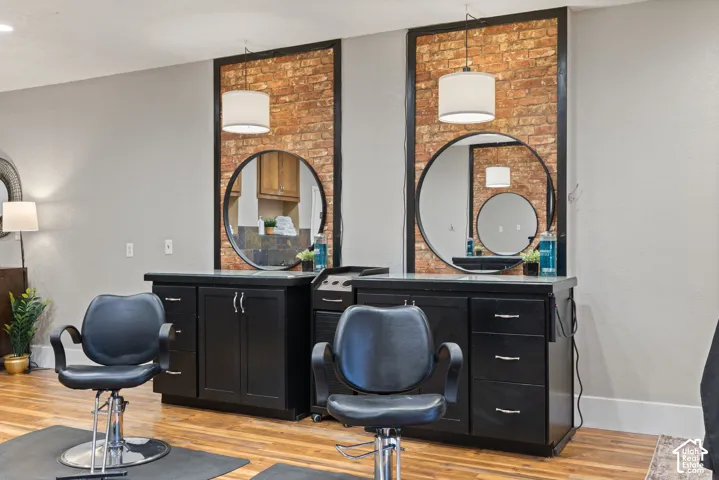 Fully equipped styling stations - Moden salon chairs, elegant mirrors, custom cabinetry and warm inviting finishes create a professional, welcoming atmosphere in this turnkey salon space.