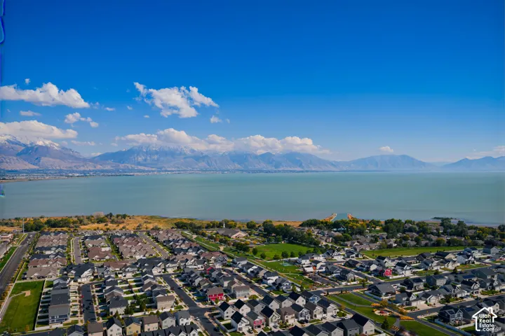 Aerial perspective featuring extensive lakefront proximity and expansive mountain range scenery