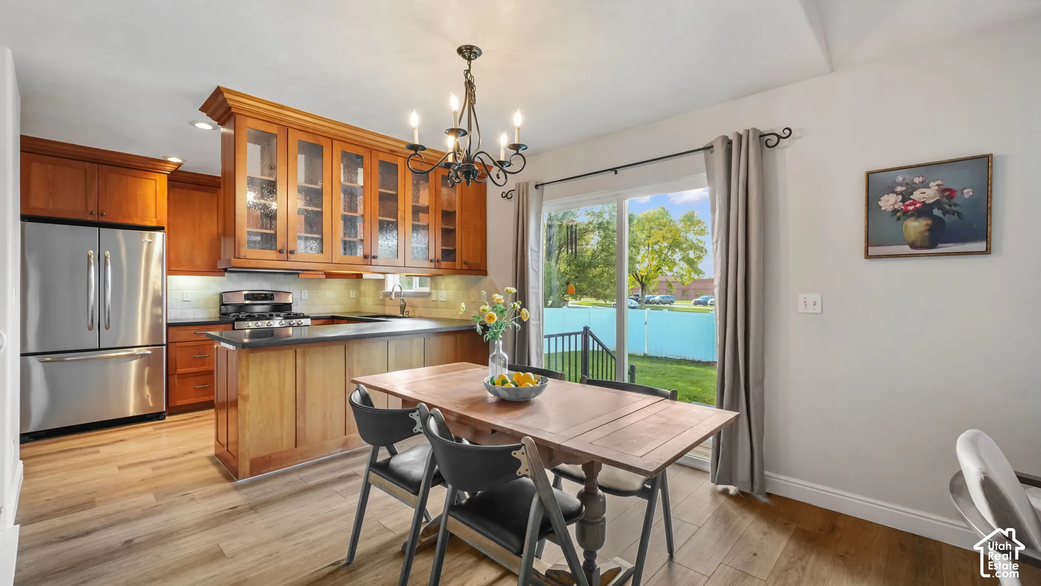 Dining area with LVP flooring and lots of natural light