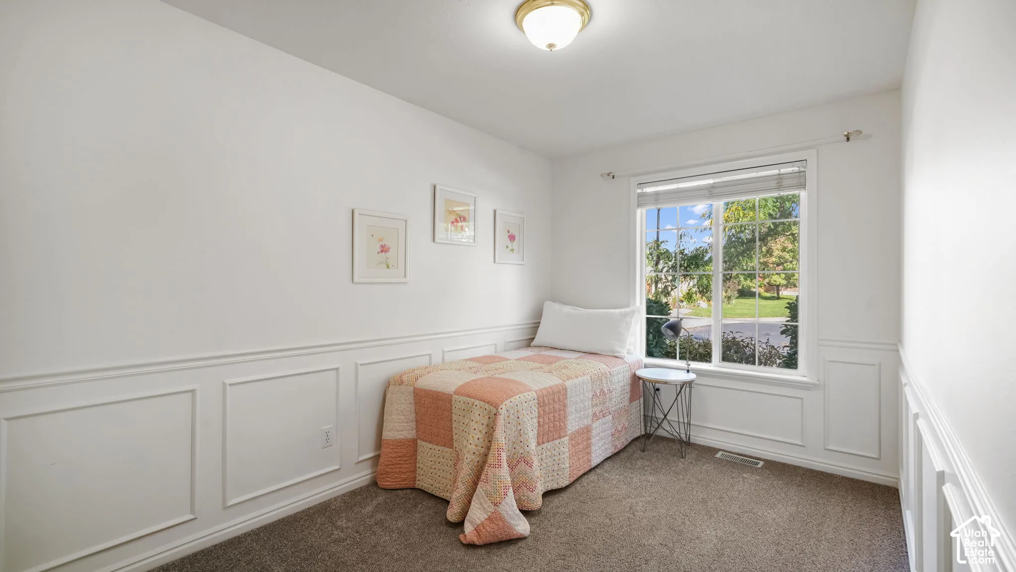 Bedroom with nice wainscoting