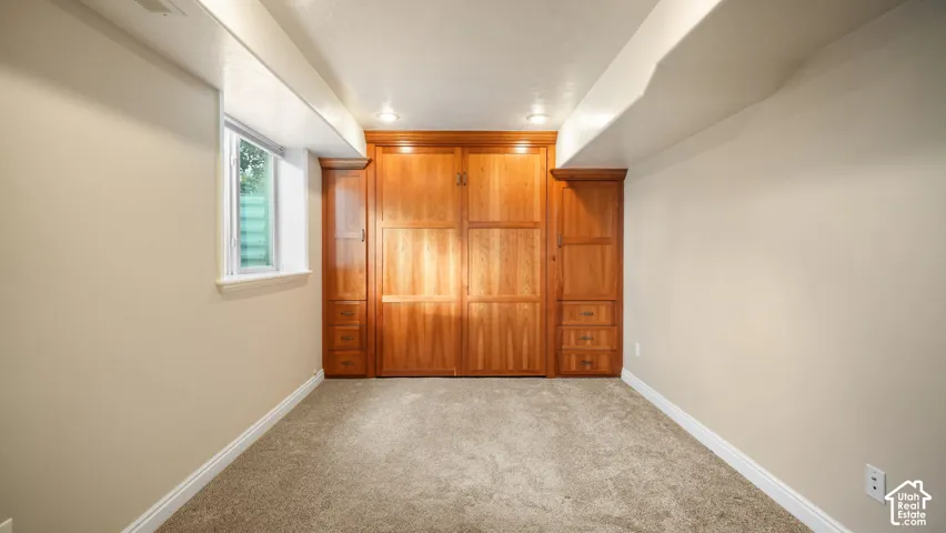 Bedroom or office with Murphy bed in basement