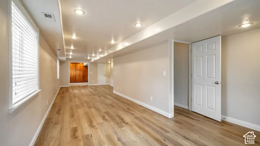 Spacious family room in the basement with LVP flooring