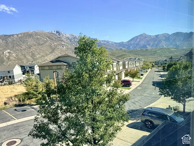 Wow! Check out those expansive mountain range views from the master bedroom window!