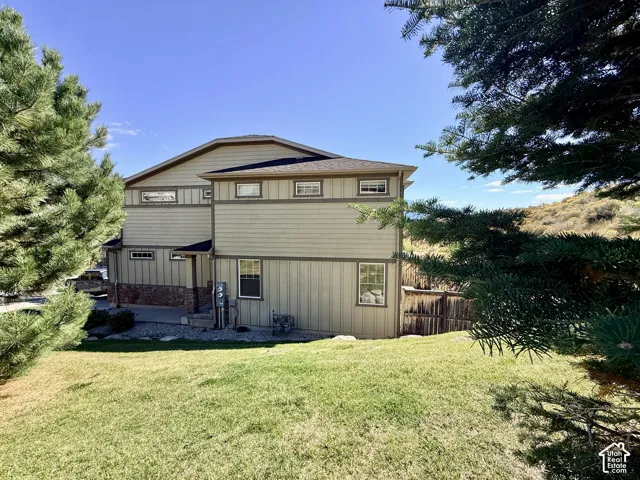 This end unit features mature trees and tons of privacy!