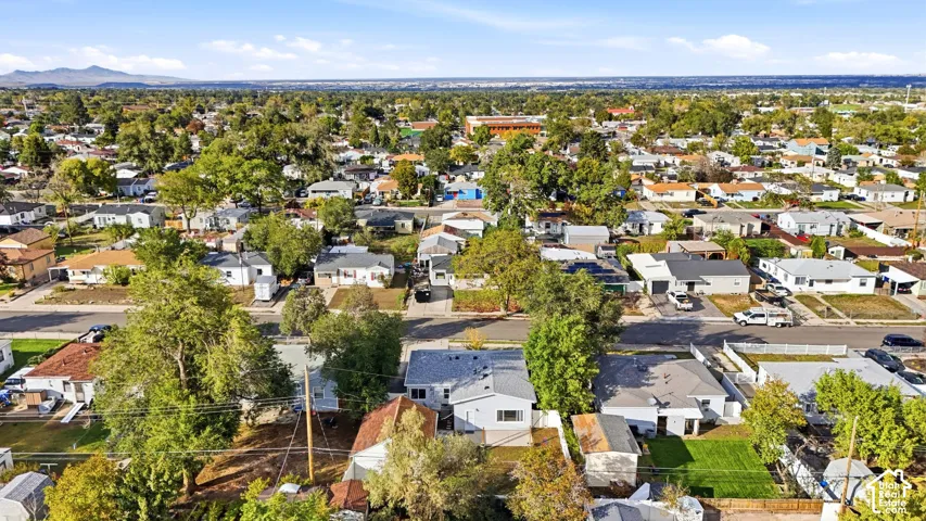 The same view without the outline. The house sits on a street of single-level homes in Kearns, with the Salt Lake Valley spread out beyond it.